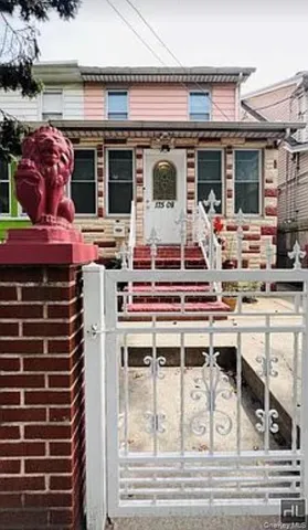 a view of a patio with table and chairs