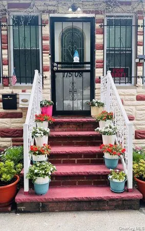 a front view of house with outdoor space and seating space
