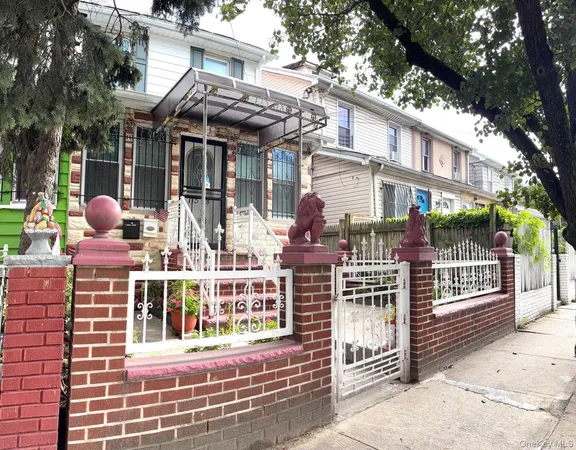 a front view of a building with street view
