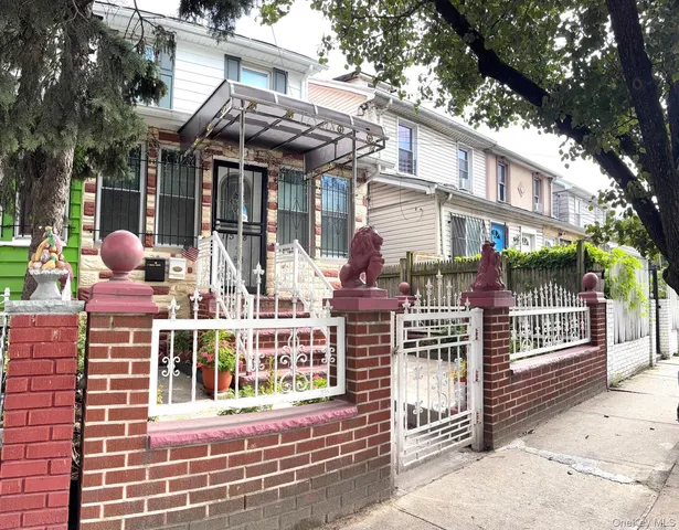 a front view of a building with street view