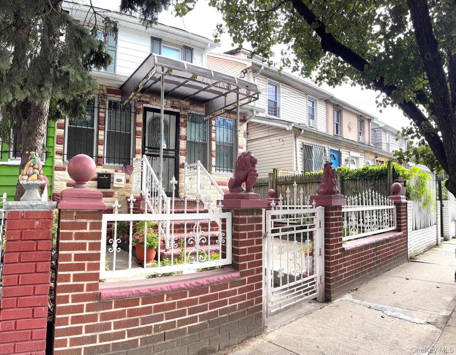 175-08 93rd Avenue Queens, NY 11433 - Photo 4 of 17 a front view of a building with street view
