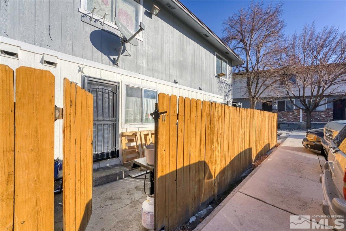1402 East 9th Street, Unit 11 Reno, NV 89512 - Photo 23 of 25 a view of walk in balcony with wooden walls and stairs