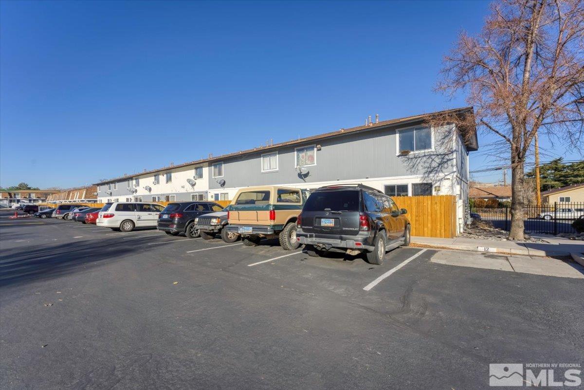 1402 East 9th Street, Unit 11 Reno, NV 89512 - Photo 25 of 25 a view of a cars park in front of a building