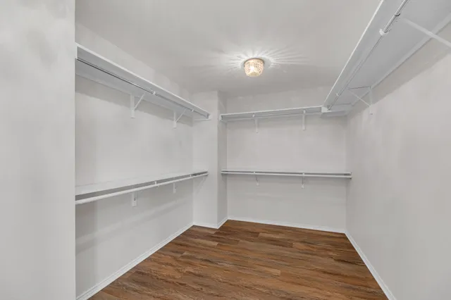 a view of an empty walk in closet