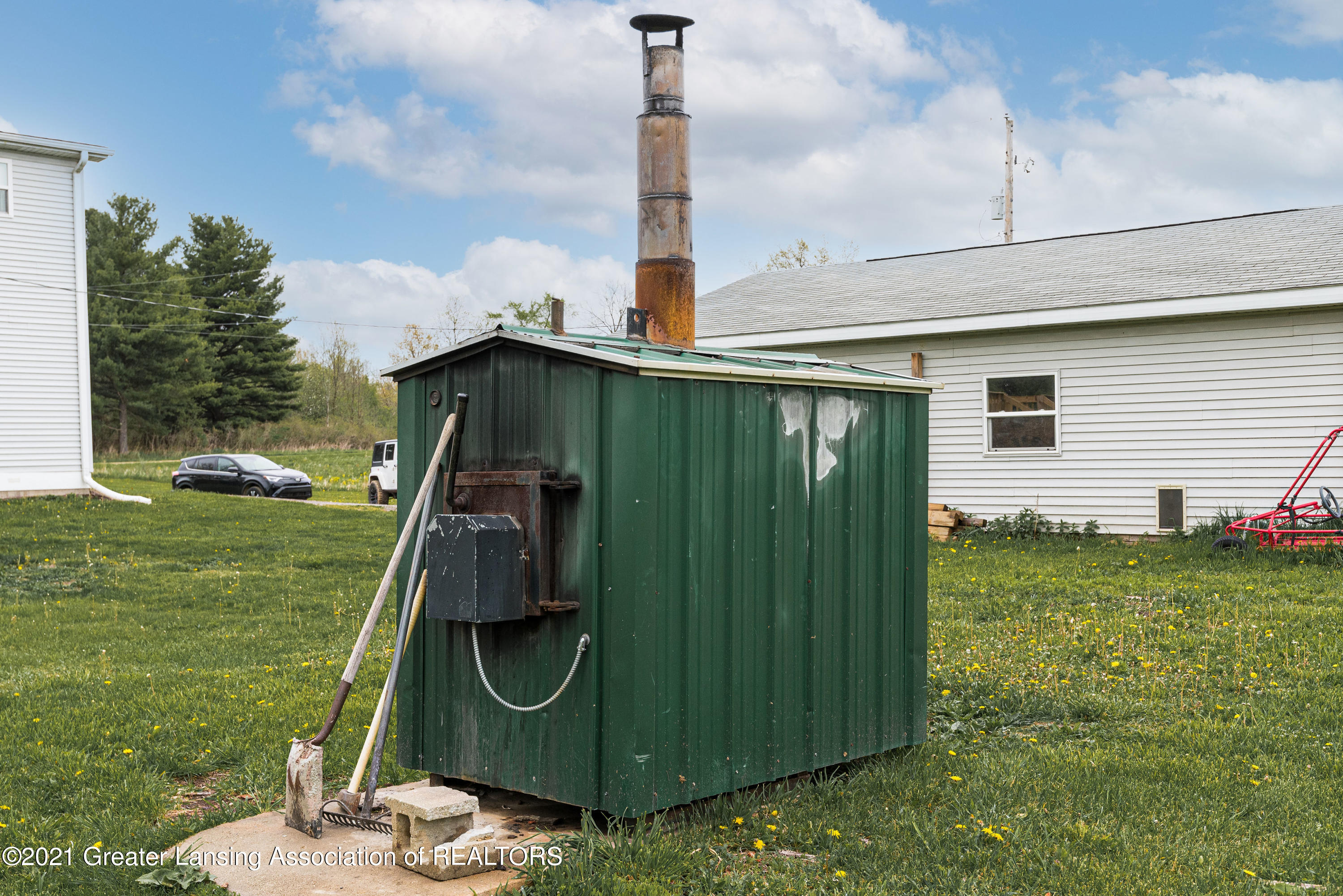 7700 Jason Road Laingsburg, MI 48848 - Photo 25 of 28 wood stove