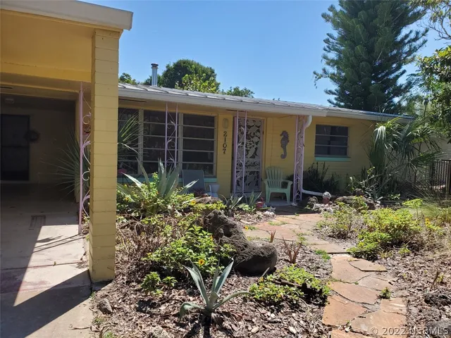 a view of house with patio