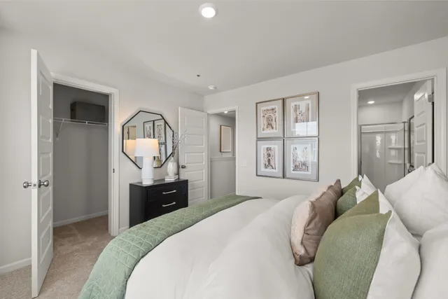 a view of an empty room and closet area