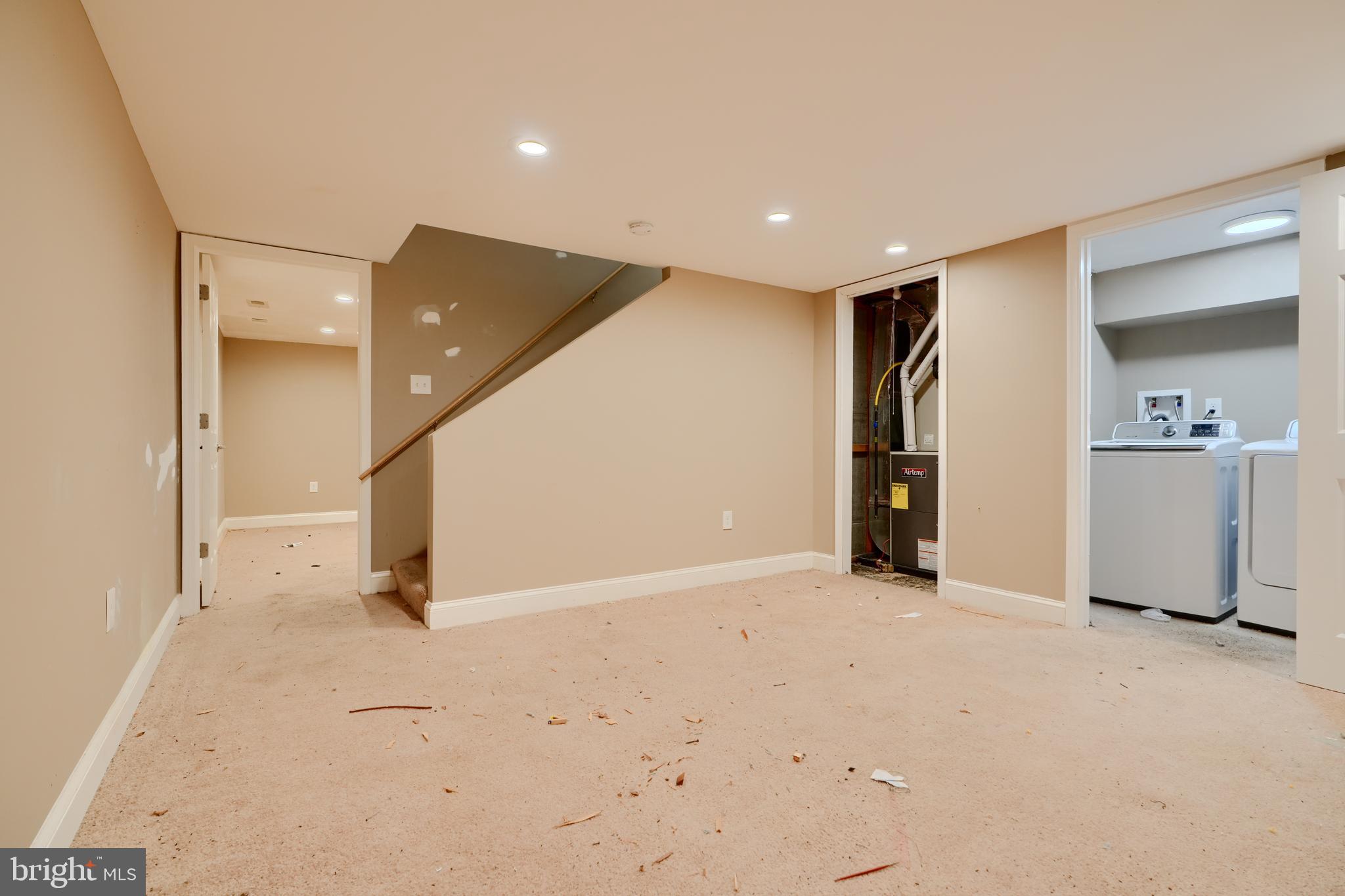 8037 North Boundary Road Dundalk, MD 21222 - Photo 23 of 36 a view of a livingroom with a staircase