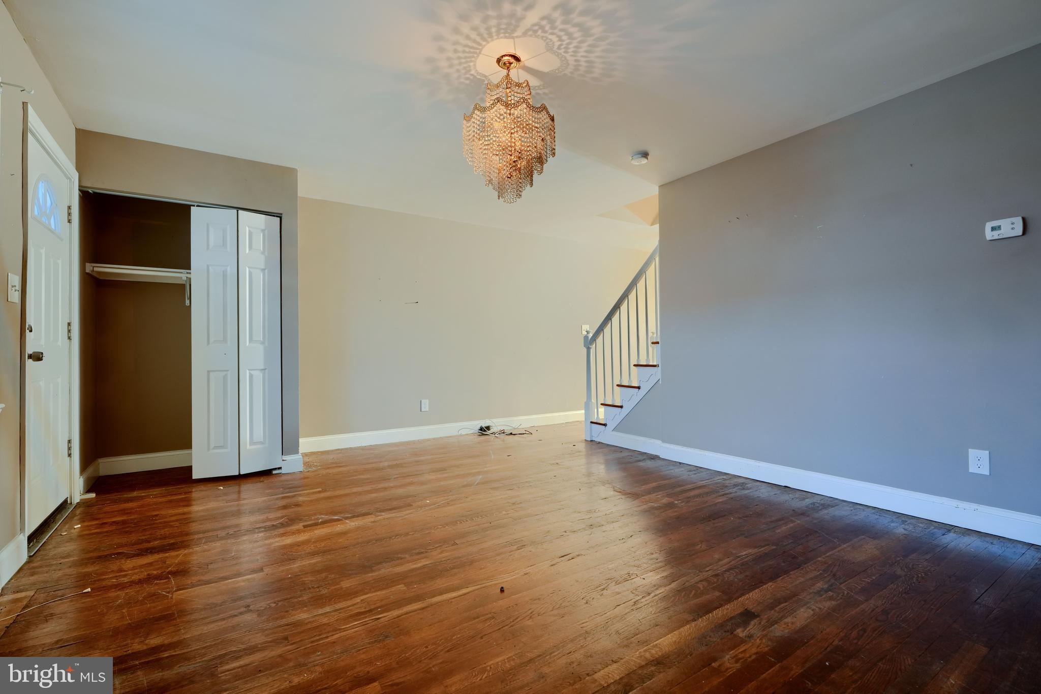 8037 North Boundary Road Dundalk, MD 21222 - Photo 7 of 36 wooden floor in an empty room with a window