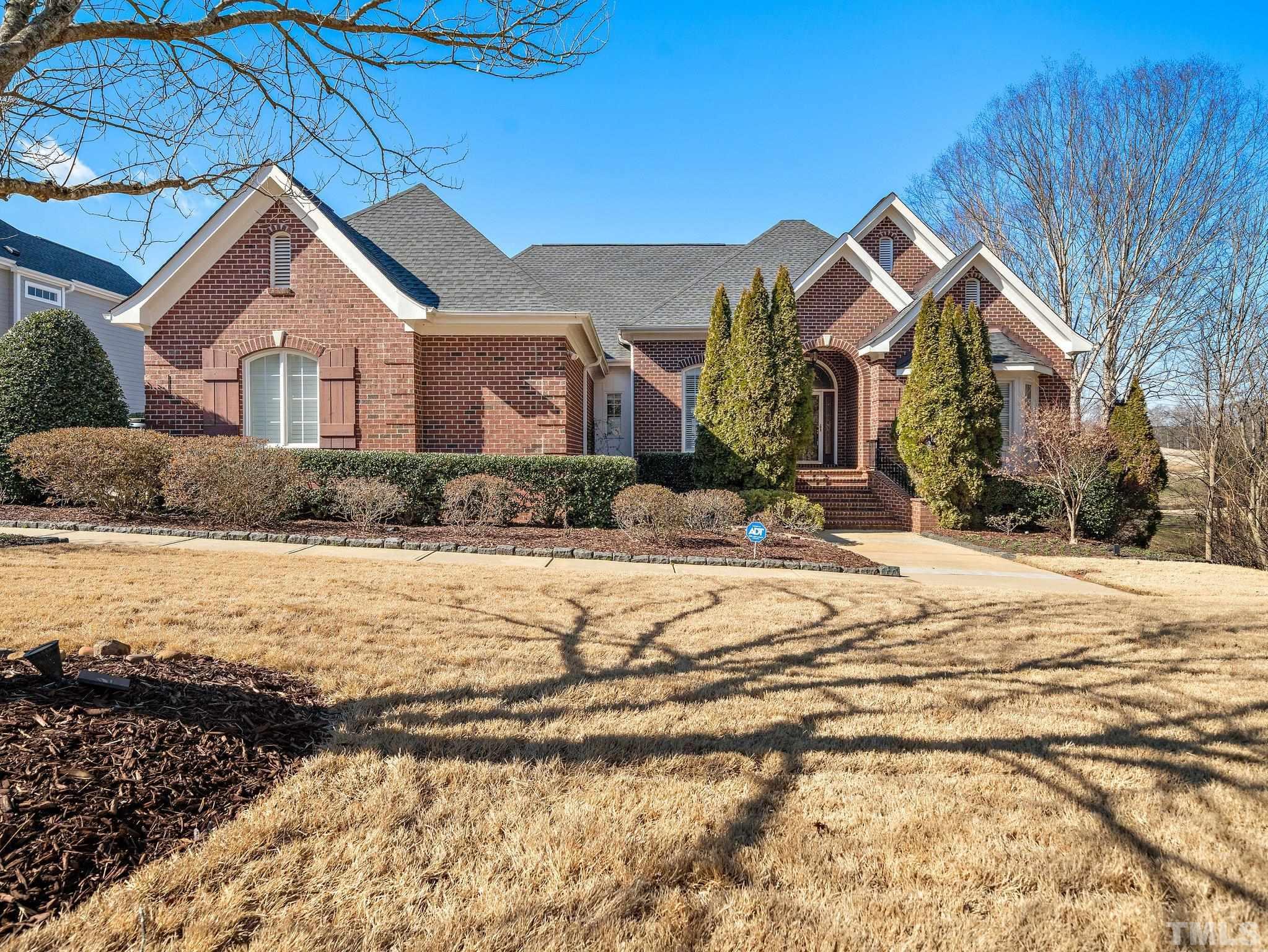619 Competition Road Raleigh, NC 27603 - Photo 1 of 28 a front view of a house with a yard