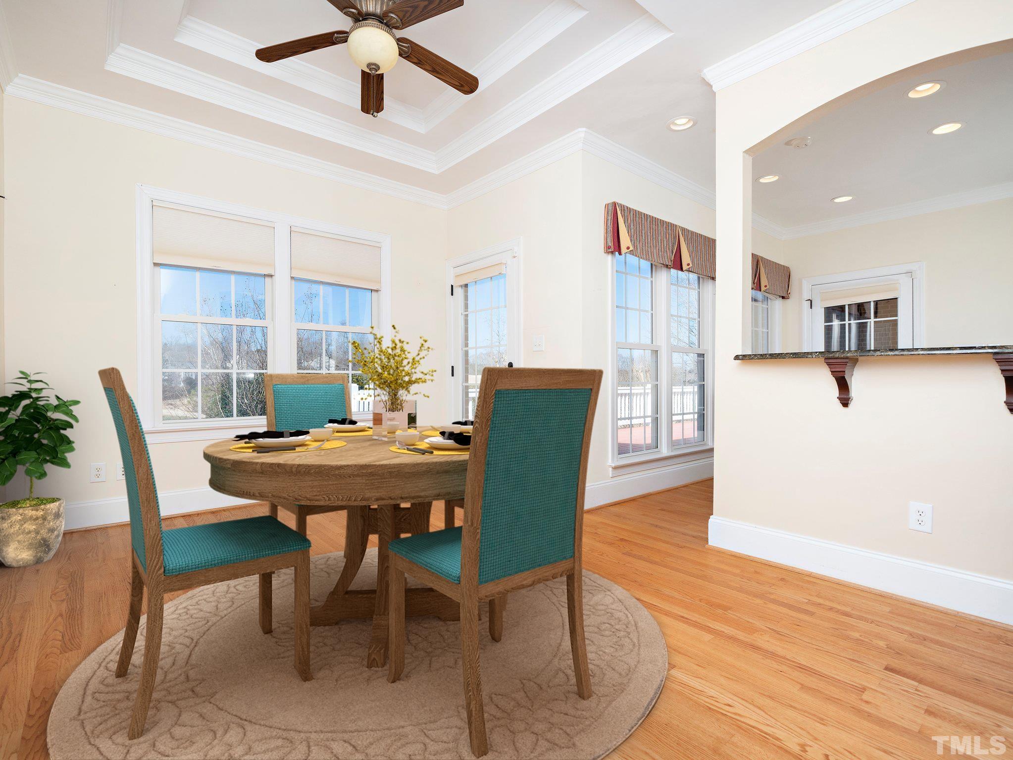 619 Competition Road Raleigh, NC 27603 - Photo 14 of 28 a view of a dining room with furniture