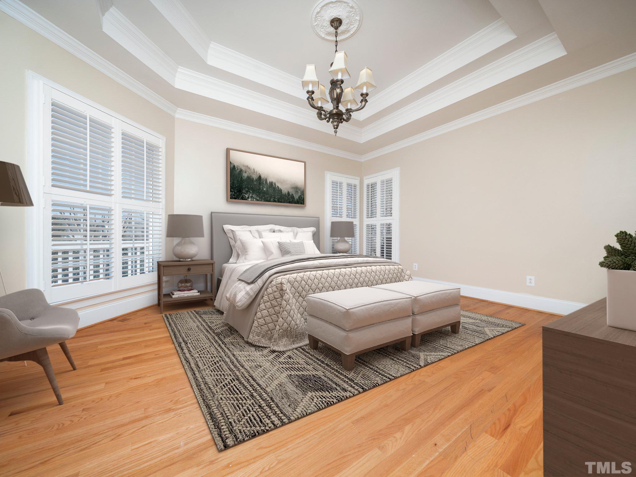 619 Competition Road Raleigh, NC 27603 - Photo 16 of 28 a bedroom with a bed wooden floor and window