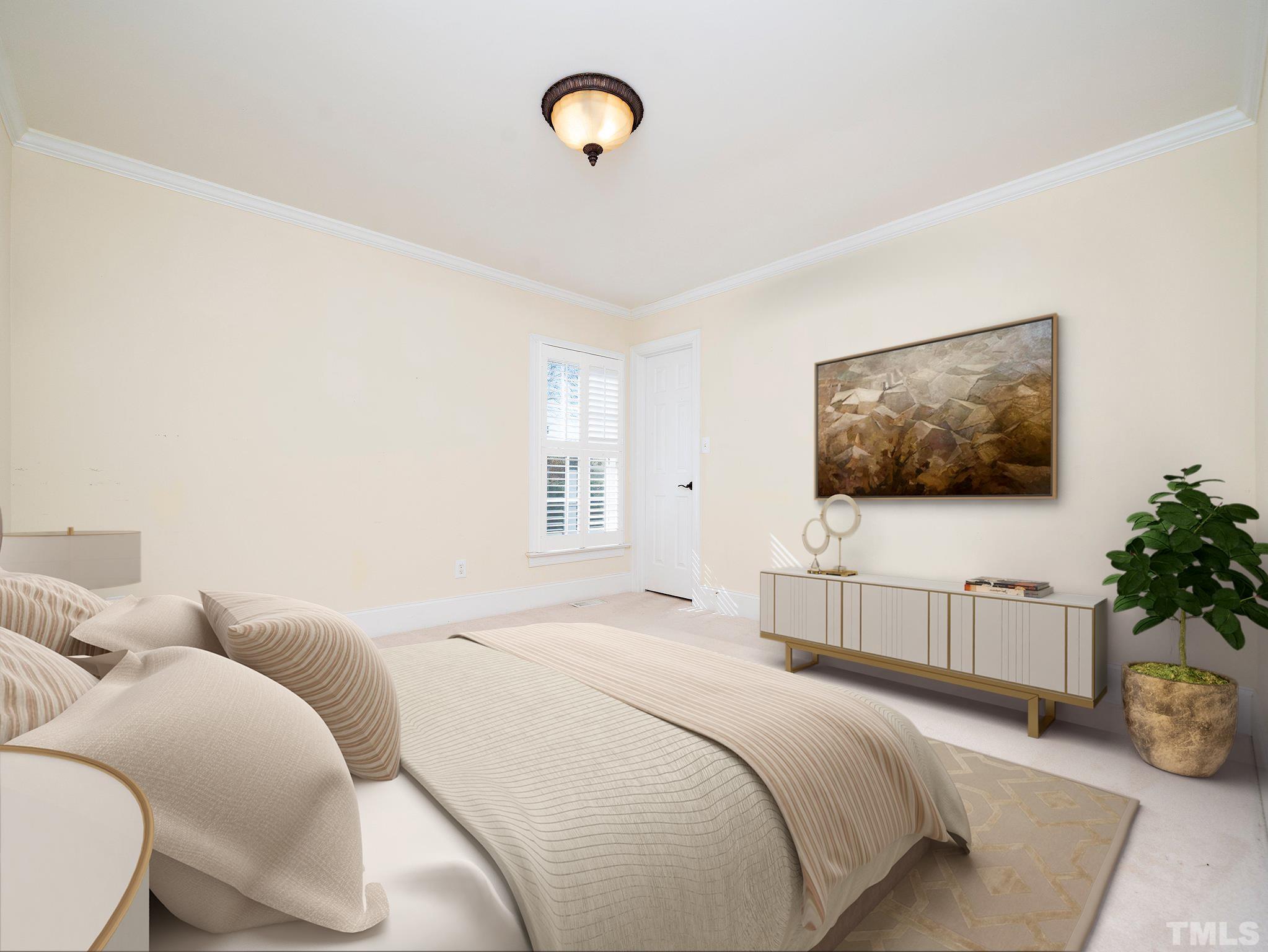 619 Competition Road Raleigh, NC 27603 - Photo 18 of 28 a bedroom with bed couches and flat screen tv