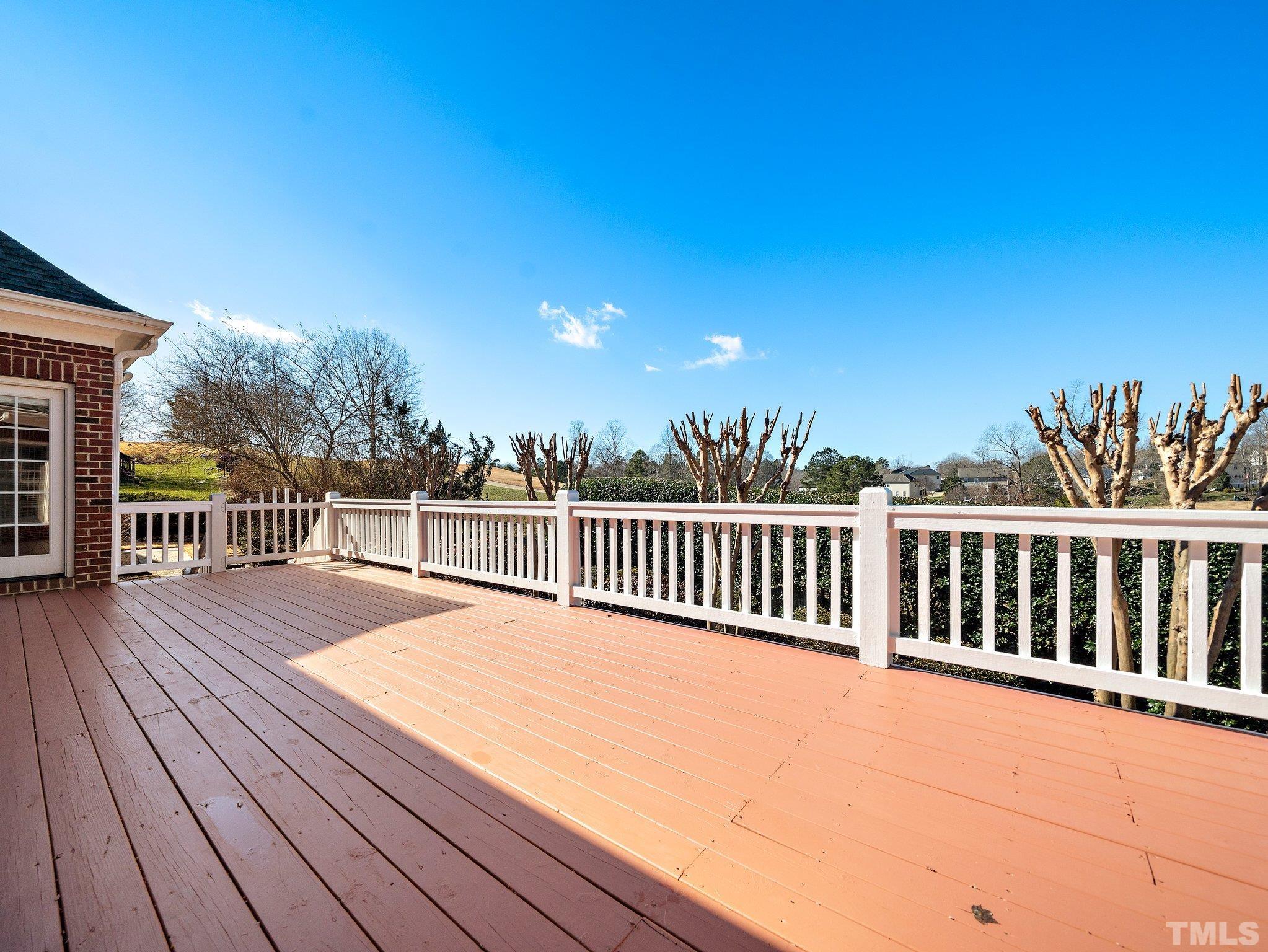 619 Competition Road Raleigh, NC 27603 - Photo 21 of 28 a view of balcony with wooden floor and fence