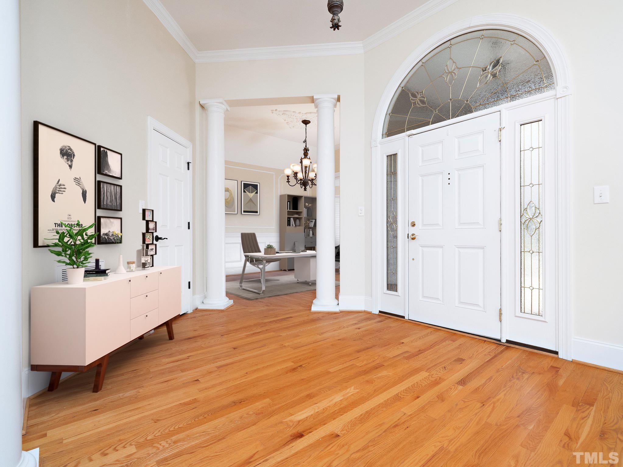 619 Competition Road Raleigh, NC 27603 - Photo 4 of 28 a spacious bedroom with a bed and a couch