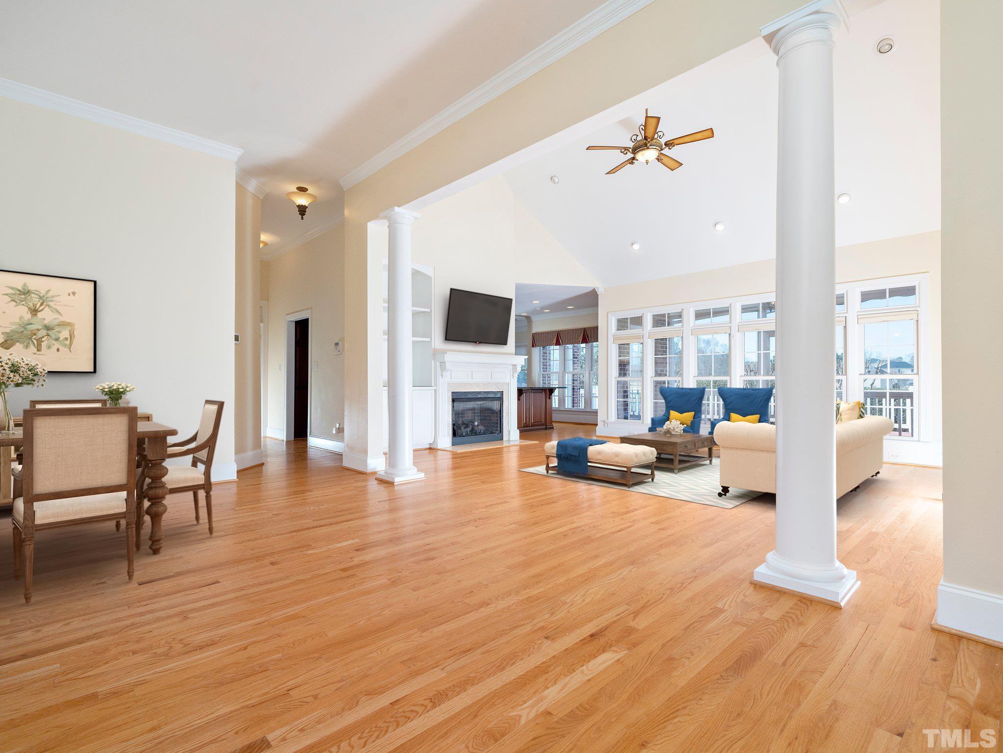 619 Competition Road Raleigh, NC 27603 - Photo 5 of 28 a living room with furniture and a wooden floor
