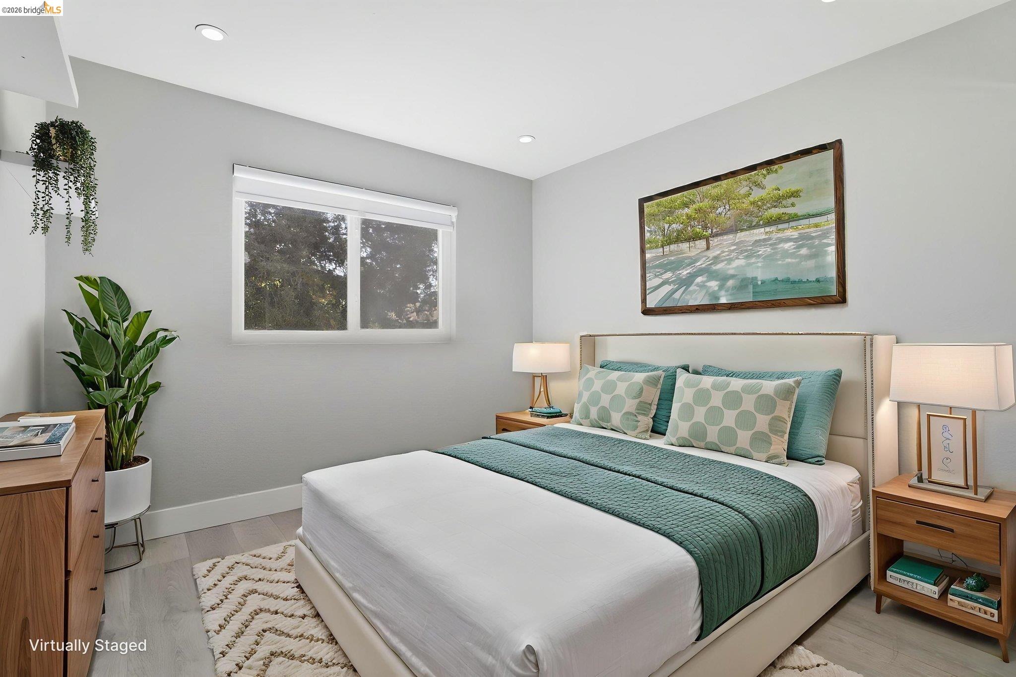 78 Shaniko Common Fremont, CA 94539 - Photo 1 of 1 a bedroom with a bed and a painting on the wall