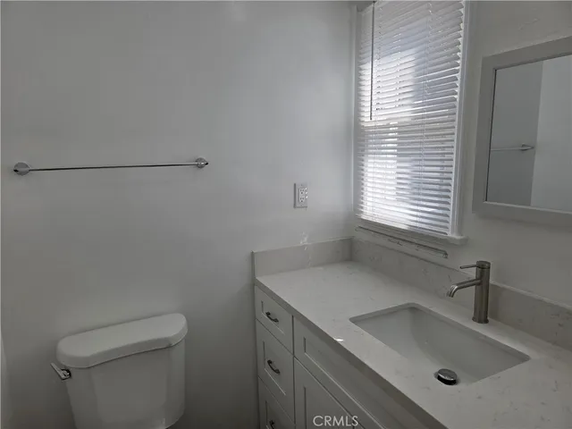 a bathroom with a sink and a toilet