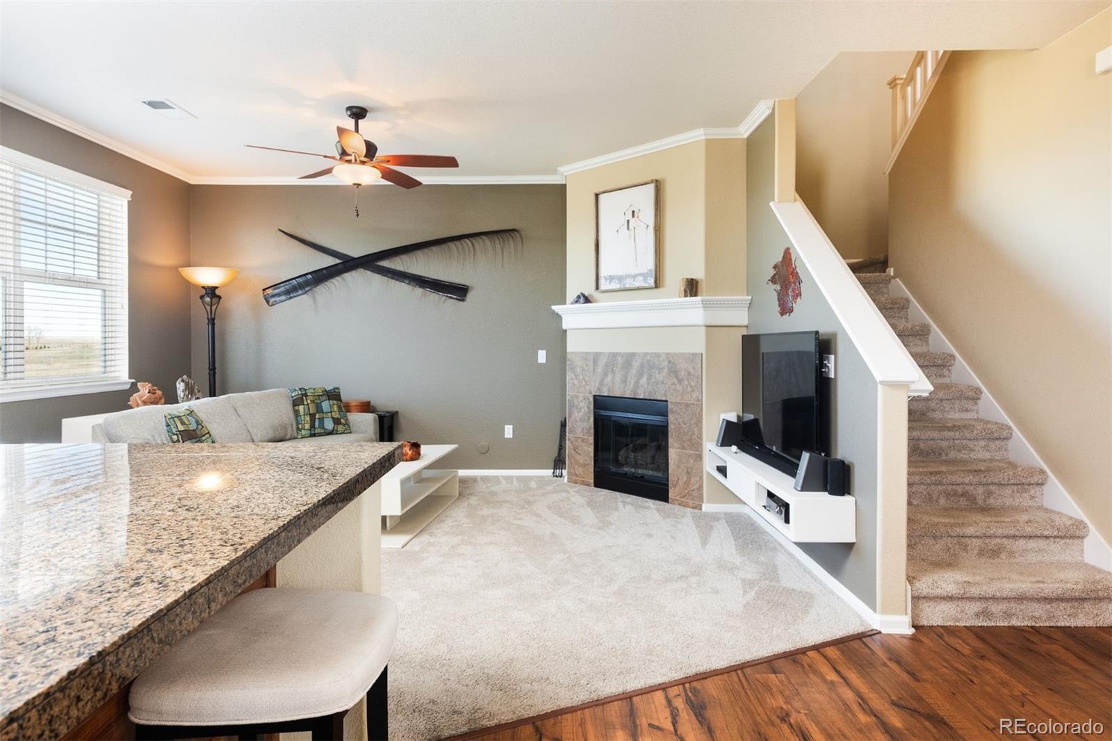 3661 South Perth Circle, Unit 6101 Aurora, CO 80013 - Photo 19 of 48 a view of kitchen with sink and microwave