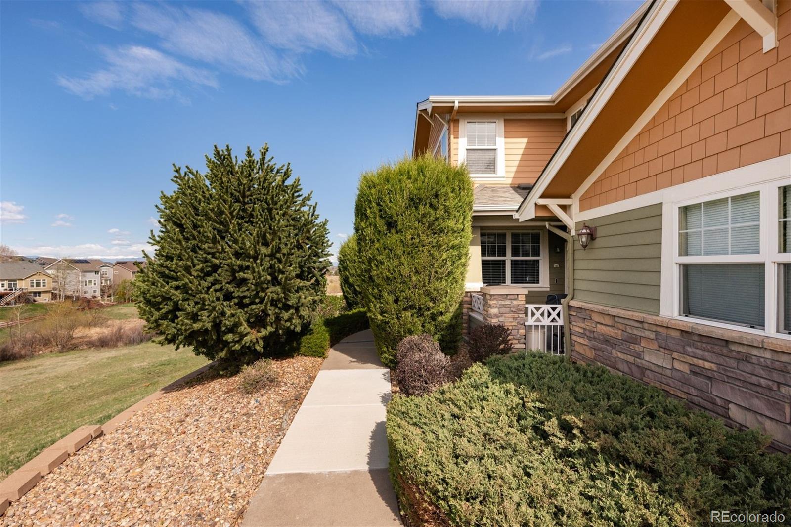 3661 South Perth Circle, Unit 6101 Aurora, CO 80013 - Photo 2 of 48 a view of a house with a patio