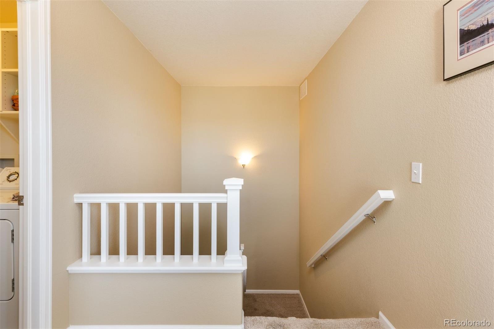 3661 South Perth Circle, Unit 6101 Aurora, CO 80013 - Photo 24 of 48 a view of staircase with white walls