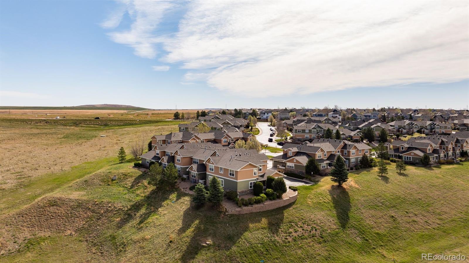 3661 South Perth Circle, Unit 6101 Aurora, CO 80013 - Photo 3 of 48 an aerial view of ocean and residential houses with outdoor space
