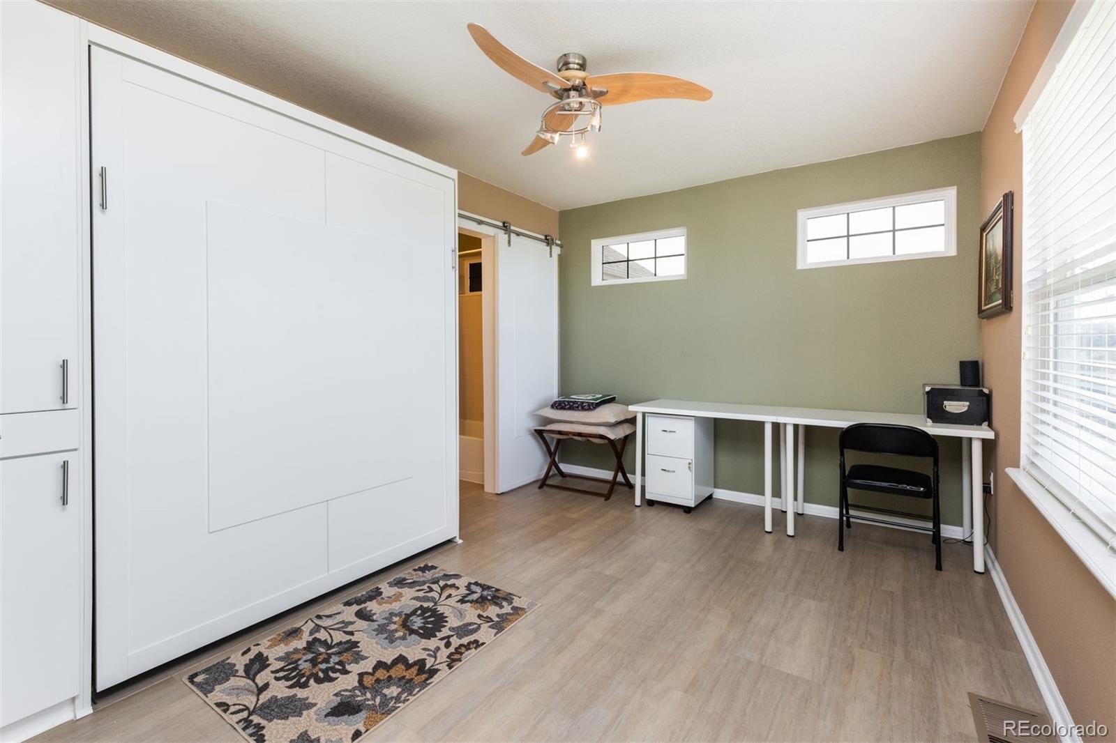 3661 South Perth Circle, Unit 6101 Aurora, CO 80013 - Photo 37 of 48 a furnished livingroom with a window