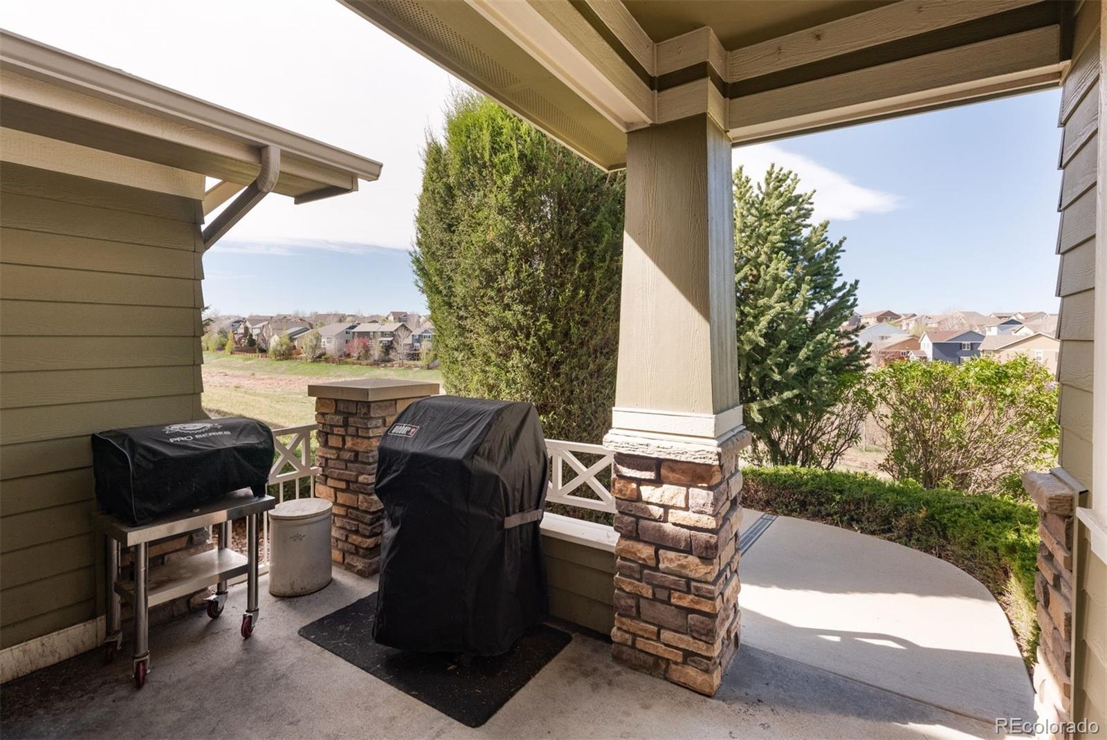 3661 South Perth Circle, Unit 6101 Aurora, CO 80013 - Photo 39 of 48 a view of a chairs and table in the balcony