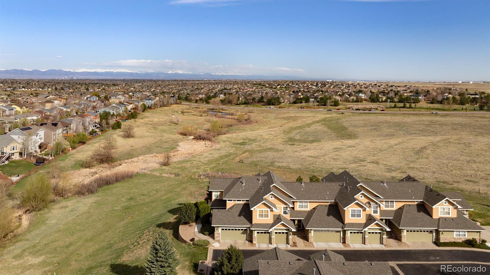 3661 South Perth Circle, Unit 6101 Aurora, CO 80013 - Photo 42 of 48 an aerial view of house with yard and ocean view