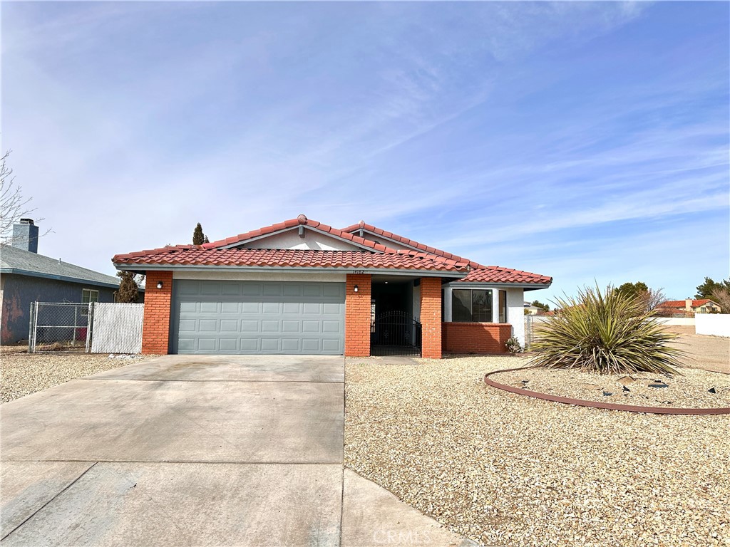 14182 Rivers Edge Road Helendale, CA 92342 - Photo 1 of 1 a view of a house with a patio