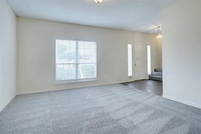 an empty room with a natural light