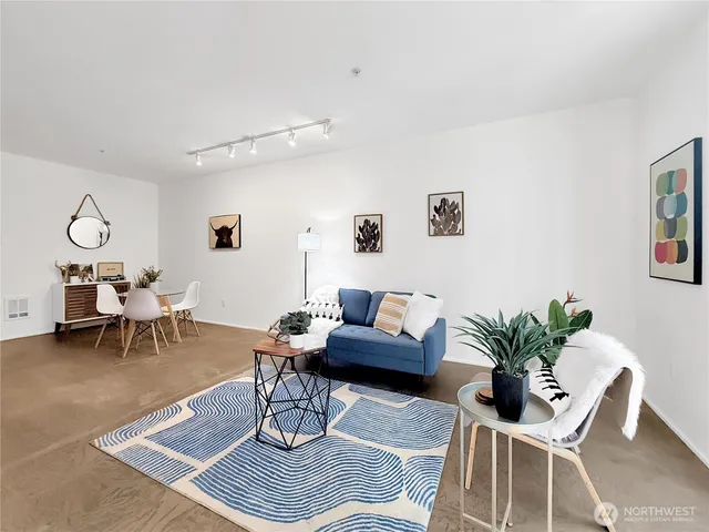 a bedroom with a bed and dresser