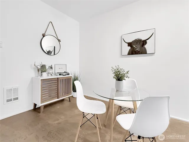 a kitchen with stainless steel appliances granite countertop a stove a refrigerator and a sink