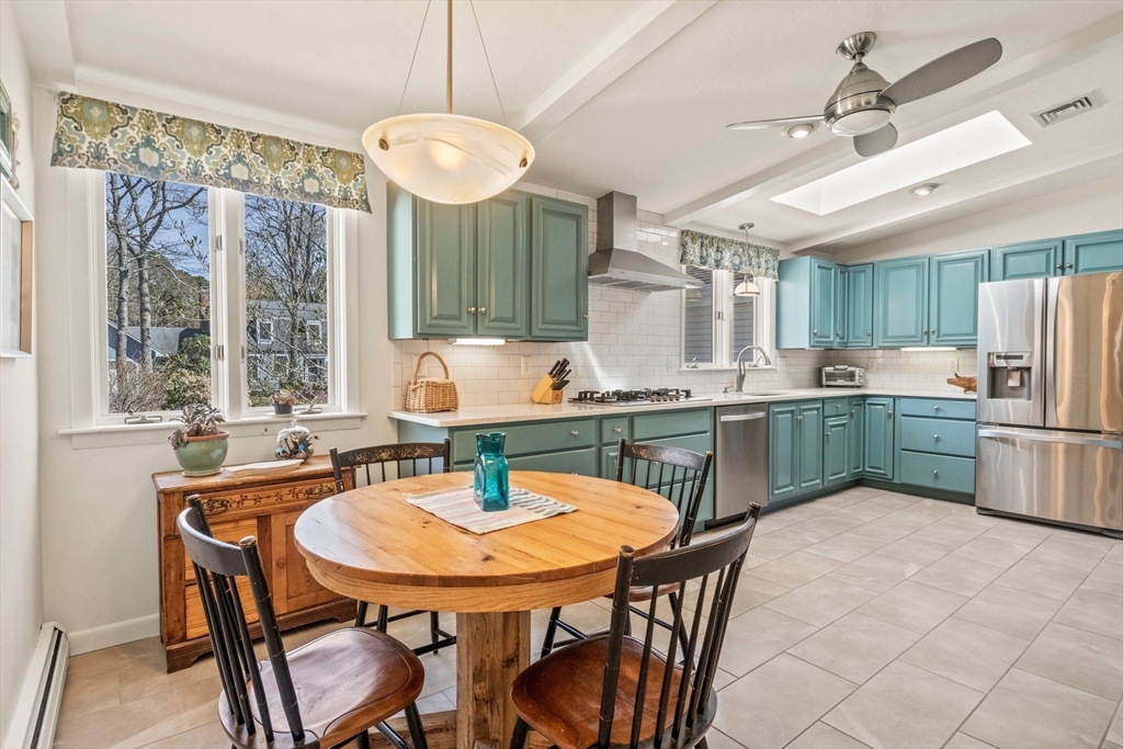 81 Crawford Road Barnstable, MA 02635 - Photo 14 of 42 a kitchen with a table chairs and a dining table