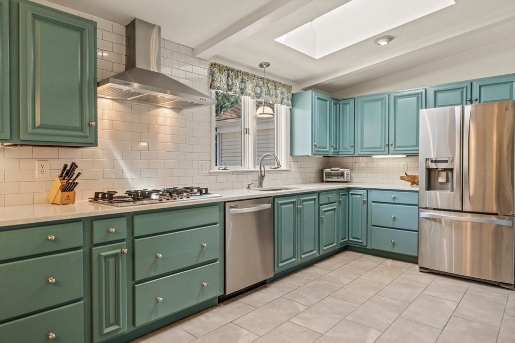81 Crawford Road Barnstable, MA 02635 - Photo 16 of 42 a kitchen with granite countertop a sink stainless steel appliances and cabinets