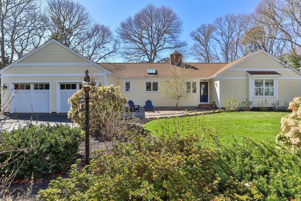 81 Crawford Road Barnstable, MA 02635 - Photo 6 of 42 a front view of house with yard and green space