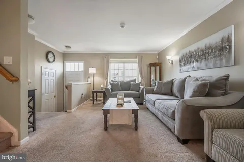a living room with furniture and a couch