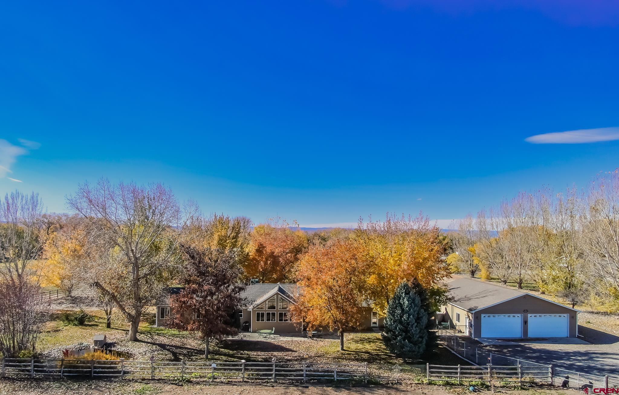 a view of a houses with a yard