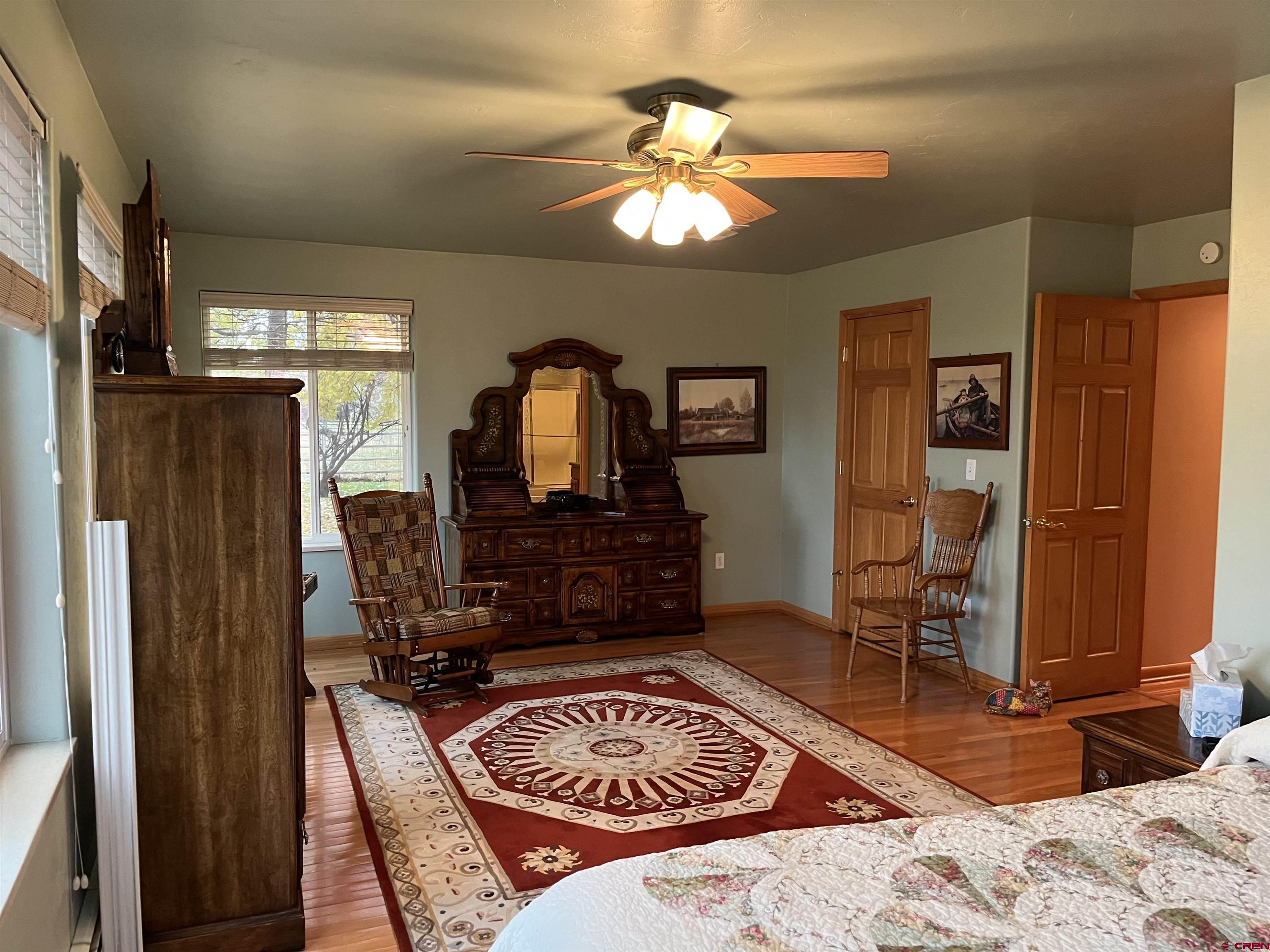 487 1775th Court Delta, CO 81416 - Photo 25 of 35 a living room with furniture and a fireplace