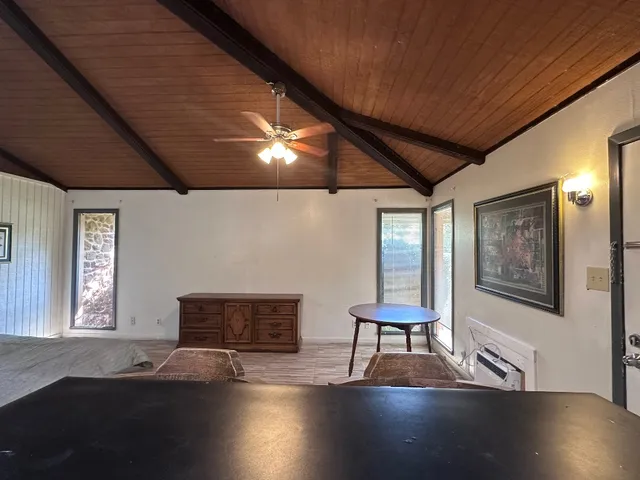 a room with furniture and a window