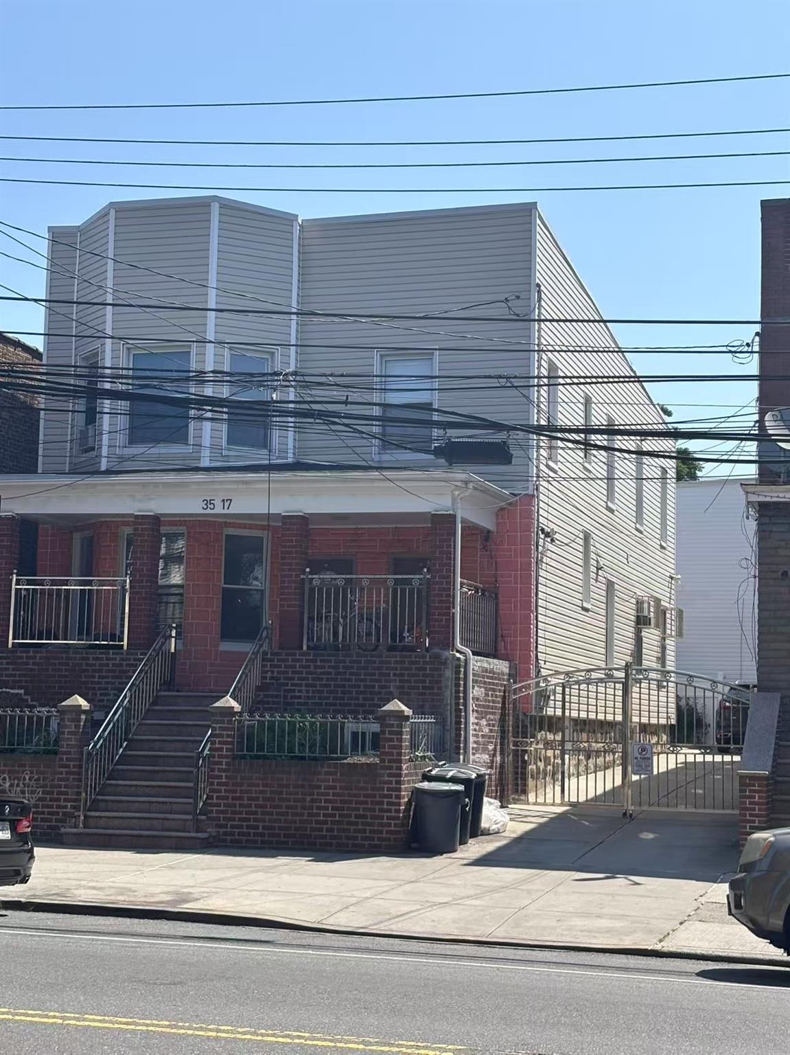 View of front facade featuring brick siding