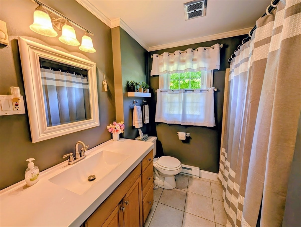 10 Harrington Road Charlton, MA 01507 - Photo 36 of 36 a bathroom with a sink toilet and shower