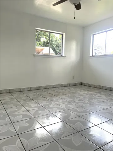 a view of a room with windows