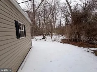 a view of the back yard of the house