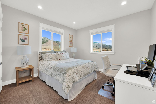 352 East Boulderville Road Oakley, UT 84055 - Photo 26 of 62 Bedroom featuring a desk, multiple windows, dark colored carpet, and recessed lighting