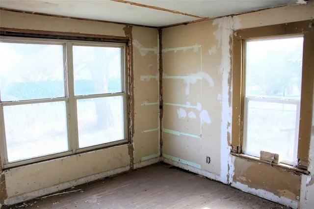 a bathroom with a sink toilet and mirror