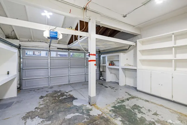 an aerial view of a house with a garden