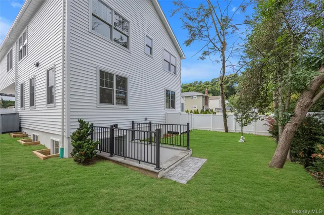 a view of a wrought iron fences in front of house