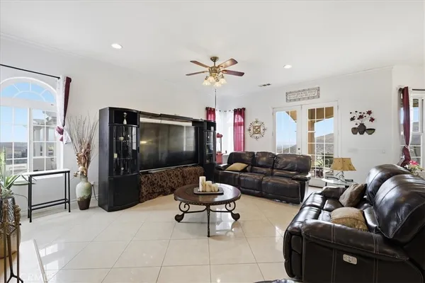 a bedroom with furniture and a fireplace