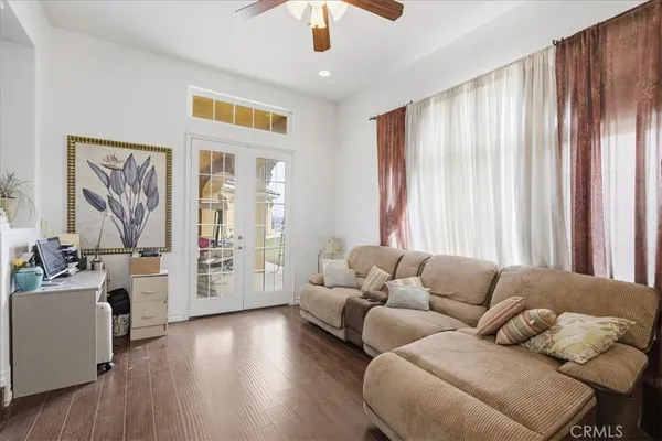 a bathroom with a double vanity sink mirror and tub